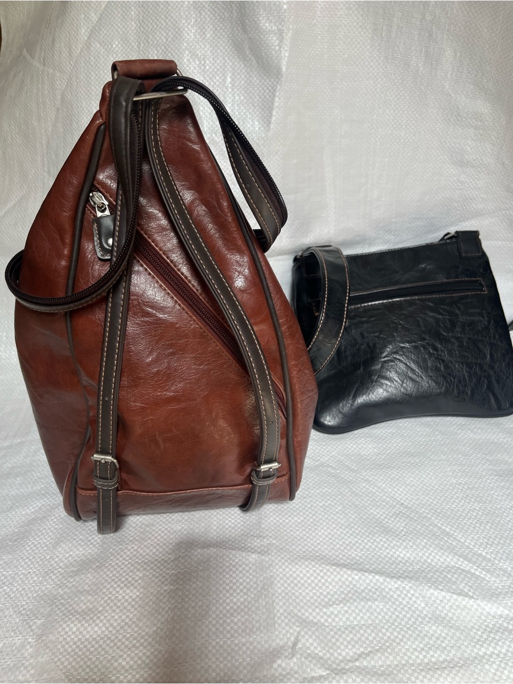 2 Mouflon bags - (1)brown sling backpack and (2) classic two-tone crossbody bag - Picture 2 of 4